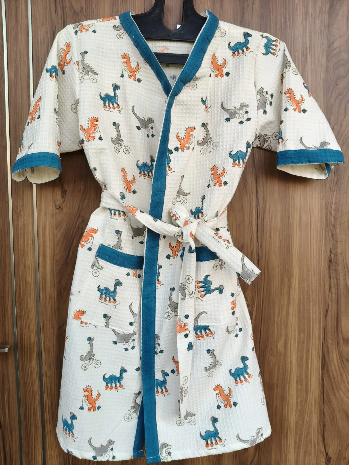 Dino Wheels Adventure Kids Waffle Bathrobe original product photograph