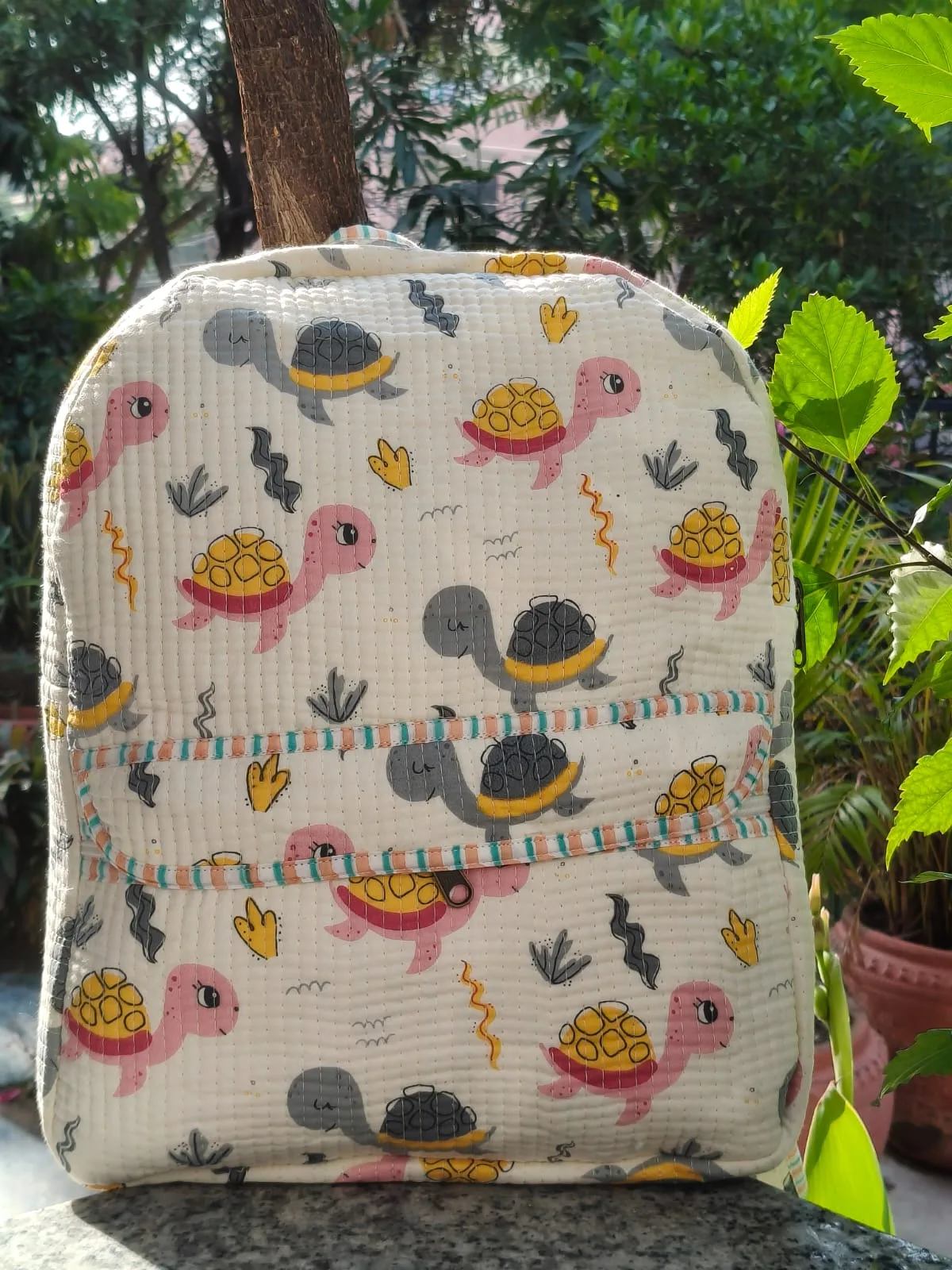 Turtle Tide Quilted Kids Backpack original product photograph